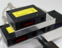 Przemysłowy laserowy czujnik triangulacyjny do bezkontaktowego pomiaru przemieszczenia i wymiarów w systemach CNC i zautomatyzowanych systemach produkcyjnych, z dostawą na całym świecie